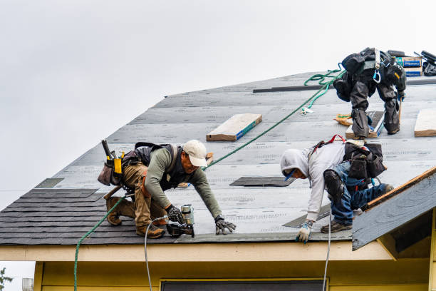 Professional Roofing technician working in Greenvale, NY